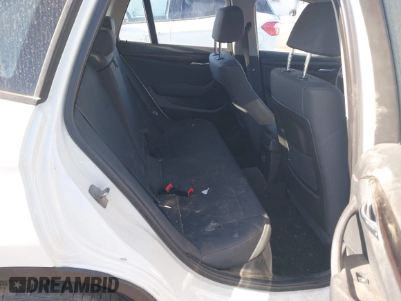 2015 BMW X1 xDrive28i z VIN WBAVL1C57FVY25598, wystawiony jako IAAI lot #41860463 z przebiegiem Nie podano mil oraz . Historia ofert i sprzedaży dostępna na DreamBid. Obrazek 8.