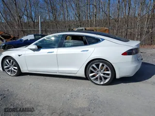 2016 Tesla Model S 90D with VIN 5YJSA1E2XGF171288, listed as a IAAI auction lot 41766075 with 112,927 mi miles. Bid and sale history available at carsss.com. Image 13.