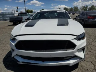 2022 Ford Mustang GT with VIN 1FA6P8CF9N5136633, listed as a Copart auction lot 51869985 with 34,974 mi miles and Salvage Title. Bid and sale history available at carsss.com. Image 5.