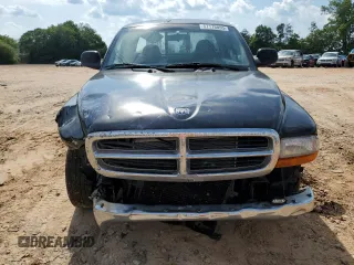 2001 Dodge Dakota z VIN 1B7GL22X81S204868, wystawiony jako Copart lot #57178895 z przebiegiem 298 667 mil mil oraz Szkoda całkowita • Salvage title. Historia ofert i sprzedaży dostępna na DreamBid. Obrazek 5.