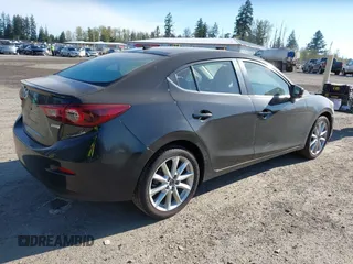 2017 Mazda 3 Grand Touring with VIN JM1BN1W38H1137226, listed as a IAAI auction lot 42034889 with 79,489 mi miles and . Bid and sale history available at DreamBid. Image 4.