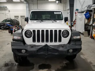 2023 Jeep Wrangler Sport S with VIN 1C4HJXDN1PW628218, listed as a Copart auction lot 48355205 with 32,009 mi miles and Salvage title. Bid and sale history available at DreamBid. Image 5.