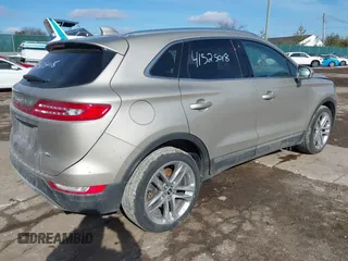 2015 Lincoln MKC z VIN 5LMCJ2A96FUJ47386, wystawiony jako IAAI lot #41525018 z przebiegiem 97 670 mil mil oraz . Historia ofert i sprzedaży dostępna na DreamBid. Obrazek 4.