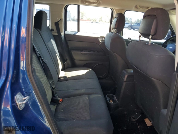 2010 Jeep Patriot Sport with VIN 1J4NT2GB9AD531637, listed as a Copart auction lot 52909885 with 282,147 mi miles and Salvage Title. Bid and sale history available at carsss.com. Image 11.