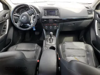 2015 Mazda CX-5 Grand Touring with VIN JM3KE4DY9F0536771, listed as a Copart auction lot 51801775 with 88,529 mi miles and Salvage Title. Bid and sale history available at DreamBid. Image 8.