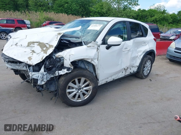 2014 Mazda CX-5 Touring z VIN JM3KE4CY9E0373359, wystawiony jako IAAI lot #42209277 z przebiegiem 106 493 mil mil oraz . Historia ofert i sprzedaży dostępna na DreamBid. Obrazek 18.