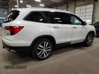 2017 Honda Pilot Elite with VIN 5FNYF6H05HB042234, listed as a Copart auction lot 51813235 with 124,950 mi miles and Salvage Title. Bid and sale history available at DreamBid. Image 3.