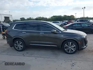 2020 Cadillac XT6 AWD Premium Luxury with VIN 1GYKPDRS2LZ205541, listed as a IAAI auction lot 41224342 with 53,947 mi miles and . Bid and sale history available at DreamBid. Image 13.