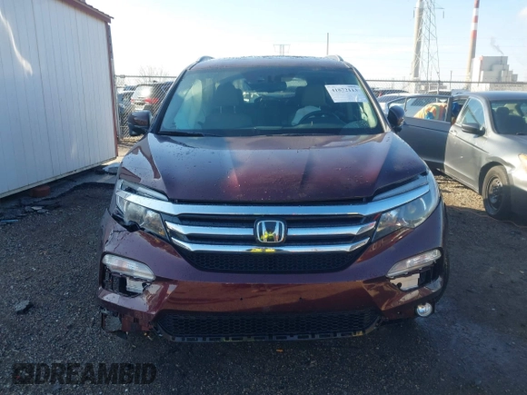 2016 Honda Pilot Touring with VIN 5FNYF6H90GB126572, listed as a IAAI auction lot 41872113 with 94,318 mi miles. Bid and sale history available at carsss.com. Image 12.