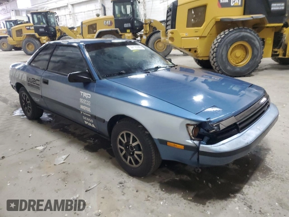 1987 Toyota Celica with VIN JT2ST67C3H7085589, listed as a Copart auction lot 44126585 with 81,830 mi miles and Salvage title. Bid and sale history available at DreamBid. Image 4.