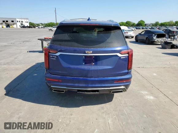 2023 Cadillac XT6 FWD Luxury z VIN 1GYKPAR42PZ167668, wystawiony jako Copart lot #53278075 z przebiegiem 32 212 mil mil oraz Szkoda całkowita • Salvage title. Historia ofert i sprzedaży dostępna na DreamBid. Obrazek 6.