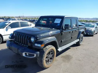 2022 Jeep Gladiator Texas Trail with VIN 1C6HJTAG7NL128584, listed as a IAAI auction lot 40630493 with Not Provided miles and . Bid and sale history available at DreamBid. Image 2.