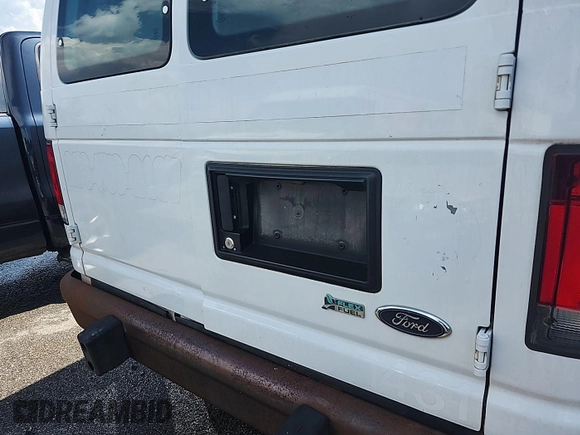 2014 Ford Econoline Cargo Commercial with VIN 1FTNE2EW0EDA53278, listed as a IAAI auction lot 42854412 with 188,803 mi miles and . Bid and sale history available at DreamBid. Image 7.