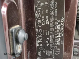 2011 Kia Optima LX z VIN KNAGM4A72B5116910, wystawiony jako Copart lot #55839845 z przebiegiem 187 943 mil mil oraz Szkoda całkowita • Salvage title. Historia ofert i sprzedaży dostępna na DreamBid. Obrazek 12.
