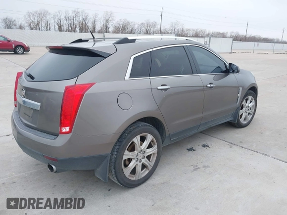 2011 Cadillac SRX Premium Collection with VIN 3GYFNCEY5BS648399, listed as a IAAI auction lot 41442819 with 184,981 mi miles. Bid and sale history available at carsss.com. Image 4.