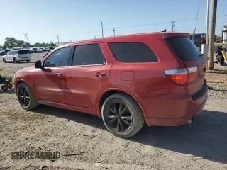 2012 Dodge Durango R/T with VIN 1C4SDHCT8CC260151, listed as a Copart auction lot 61675644 with 151,467 mi miles and Salvage title. Bid and sale history available at DreamBid. Image 2.