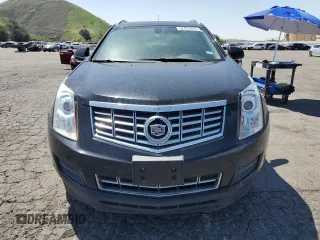 2015 Cadillac SRX Luxury Collection z VIN 3GYFNBE30FS527431, wystawiony jako Copart lot #52437015 z przebiegiem 110 395 mil mil oraz Czysty tytuł • Clean title. Historia ofert i sprzedaży dostępna na DreamBid. Obrazek 5.
