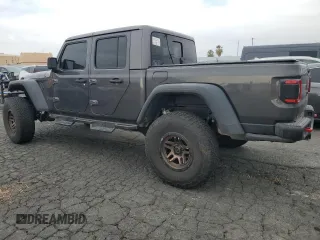 2021 Jeep Gladiator Rubicon with VIN 1C6JJTBG9ML512347, listed as a Copart auction lot 43197415 with 134,608 mi miles and Salvage title. Bid and sale history available at DreamBid. Image 2.