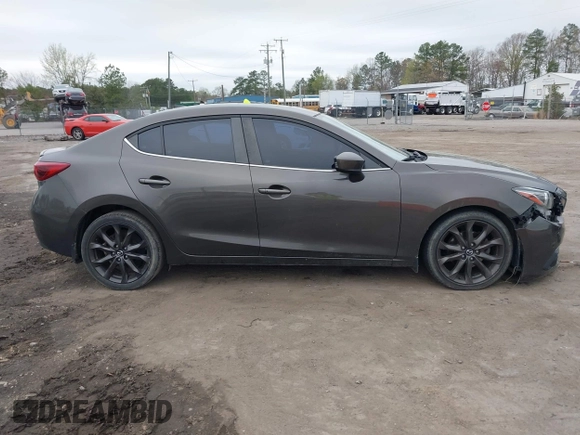 2014 Mazda 3 S Grand Touring with VIN JM1BM1W39E1145186, listed as a IAAI auction lot 41948404 with 111,702 mi miles and . Bid and sale history available at DreamBid. Image 13.