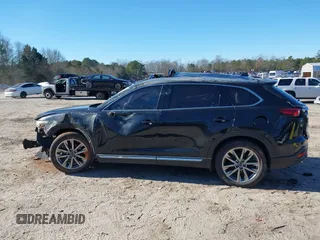 2018 Mazda CX-9 Grand Touring z VIN JM3TCADY5J0204845, wystawiony jako IAAI lot #41292695 z przebiegiem 98 751 mil mil oraz . Historia ofert i sprzedaży dostępna na DreamBid. Obrazek 14.