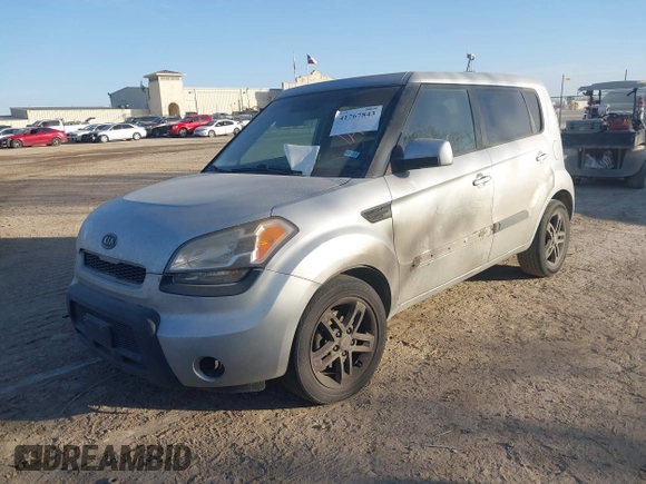 2011 Kia Soul + with VIN KNDJT2A28B7712001, listed as a IAAI auction lot 41767843 with 218,016 mi miles. Bid and sale history available at carsss.com. Image 2.