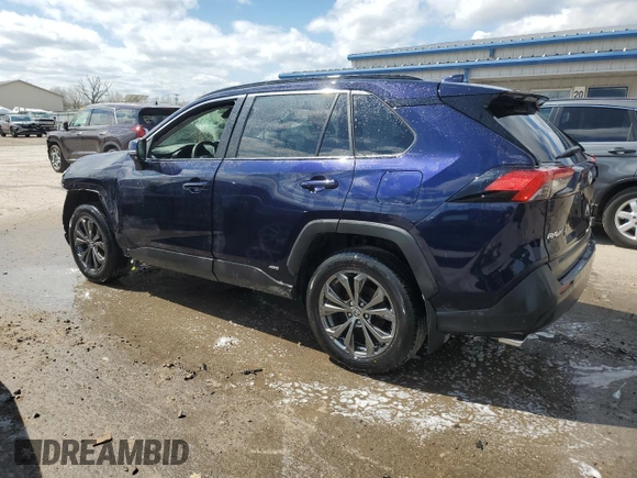 2023 Toyota RAV4 Hybrid XLE Premium with VIN JTMB6RFV2PD097428, listed as a Copart auction lot 52439575 with 13,955 mi miles and Salvage Title. Bid and sale history available at carsss.com. Image 2.
