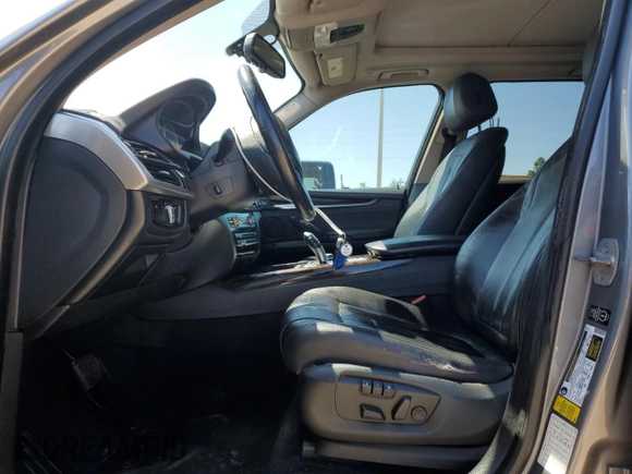 2014 BMW X5 sDrive35i with VIN 5UXKR2C56E0H33647, listed as a Copart auction lot 52218705 with 192,848 mi miles and Clean Title. Bid and sale history available at carsss.com. Image 7.