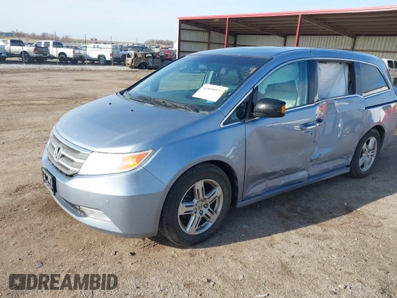 2011 Honda Odyssey Touring with VIN 5FNRL5H9XBB085626, listed as a IAAI auction lot 41890577 with 178,317 mi miles and . Bid and sale history available at DreamBid. Image 17.