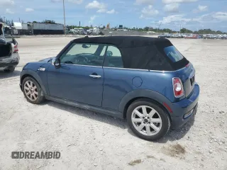2011 MINI Convertible S with VIN WMWZP3C50BTX83220, listed as a Copart auction lot 61590205 with 80,979 mi miles and Salvage title. Bid and sale history available at DreamBid. Image 2.