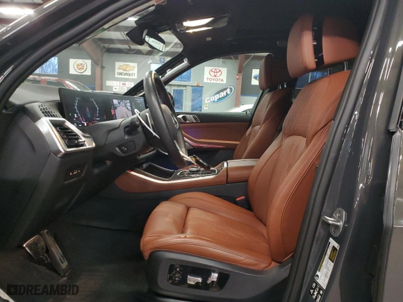 2025 BMW X5 M60i with VIN 5UX33EU06S9W32977, listed as a Copart auction lot 85755824 with 272 mi miles and Salvage Title. Bid and sale history available at carsss.com. Image 7.