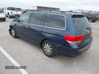 2009 Honda Odyssey EX-L with VIN 5FNRL38769B409281, listed as a IAAI auction lot 42013137 with 213,934 mi miles and . Bid and sale history available at DreamBid. Image 3.