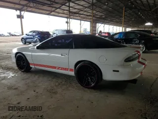 2001 Chevrolet Camaro Z28 z VIN 2G1FP22G612106148, wystawiony jako Copart lot #51154555 z przebiegiem 81 209 mil mil oraz Szkoda całkowita • Salvage title. Historia ofert i sprzedaży dostępna na DreamBid. Obrazek 2.