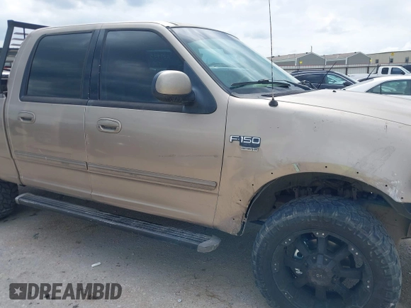 2003 Ford F-150 XLT with VIN 1FTRW08653KA87935, listed as a IAAI auction lot 42101353 with 1 mi miles. Bid and sale history available at carsss.com. Image 6.