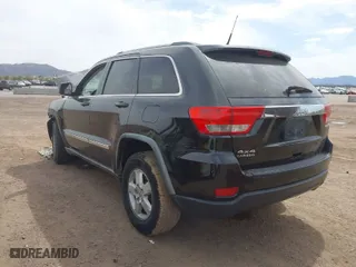 2011 Jeep Grand Cherokee Laredo with VIN 1J4RR4GGXBC506728, listed as a IAAI auction lot 41889334 with 236,099 mi miles. Bid and sale history available at carsss.com. Image 3.