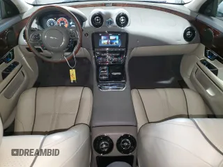 2016 Jaguar XJ R-Sport with VIN SAJWJ1CDXG8W00145, listed as a Copart auction lot 49901234 with 76,629 mi miles and . Bid and sale history available at DreamBid. Image 8.