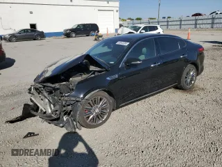 2018 Kia Optima SX with VIN 5XXGV4L26JG206377, listed as a Copart auction lot 58848385 with Not provided miles and Salvage title. Bid and sale history available at DreamBid. Image 1.