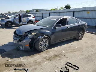 2009 Mazda 6 i Grand Touring with VIN 1YVHP82A595M39983, listed as a Copart auction lot 64133305 with Not provided miles and Salvage title. Bid and sale history available at DreamBid. Image 1.