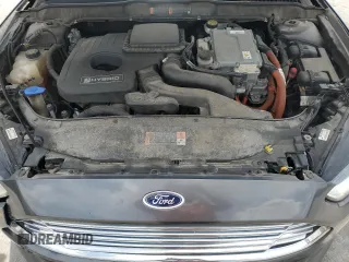 2015 Ford Fusion SE Hybrid with VIN 3FA6P0LUXFR220930, listed as a Copart auction lot 58407235 with 179,682 mi miles and Salvage title. Bid and sale history available at DreamBid. Image 11.