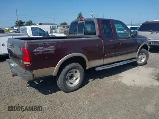 2000 Ford F-150 XL с VIN 1FTRX18L0YKA02144, выставлен на аукционе IAAI как лот 42149124 с пробегом 189 528 миль миль и . История ставок и продаж доступна на DreamBid. Изображение 4.