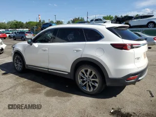 2017 Mazda CX-9 Signature with VIN JM3TCBEY4H0129361, listed as a Copart auction lot 56929295 with 96,686 mi miles and Salvage title. Bid and sale history available at DreamBid. Image 2.