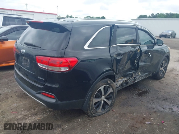2018 Kia Sorento EX with VIN 5XYPH4A52JG354719, listed as a IAAI auction lot 42385011 with 151,567 mi miles and . Bid and sale history available at DreamBid. Image 4.