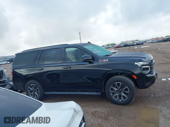 2023 Chevrolet Tahoe Z71 with VIN 1GNSKPKD9PR389603, listed as a IAAI auction lot 42082916 with 33,843 mi miles and . Bid and sale history available at DreamBid. Image 14.