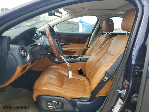 2015 Jaguar XJ with VIN SAJWJ2GD8F8V84252, listed as a Copart auction lot 49313935 with 90,545 mi miles and Salvage Title. Bid and sale history available at carsss.com. Image 7.