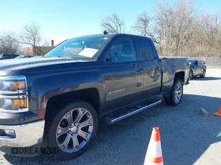 2014 Chevrolet Silverado 1500 LT with VIN 1GCVKREC0EZ377177, listed as a IAAI auction lot 41683600 with 148,672 mi miles and . Bid and sale history available at DreamBid. Image 6.