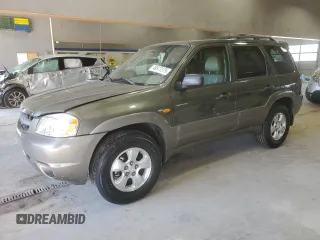 2002 Mazda Tribute LX with VIN 4F2YU09142KM39082, listed as a Copart auction lot 49973375 with 128,002 mi miles and Clean Title. Bid and sale history available at carsss.com. Image 1.