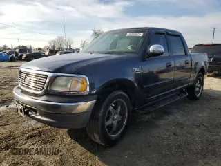 2002 Ford F-150 XLT with VIN 1FTRW07LX2KC22722, listed as a Copart auction lot 46000825 with 270,945 mi miles and Salvage Title. Bid and sale history available at carsss.com. Image 1.