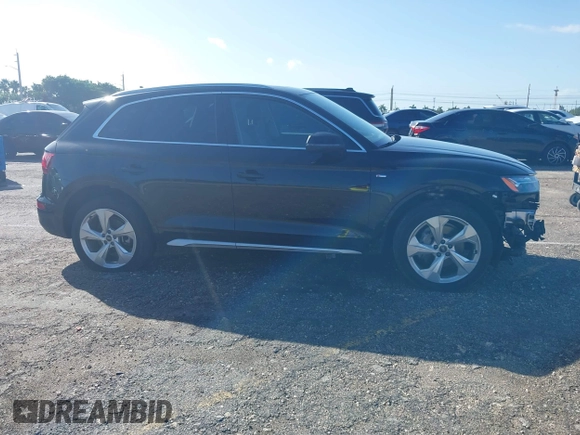 2023 Audi Q5 S line Premium Plus z VIN WA1EAAFY5P2128250, wystawiony jako IAAI lot #40666613 z przebiegiem 27 940 mil mil oraz . Historia ofert i sprzedaży dostępna na DreamBid. Obrazek 14.