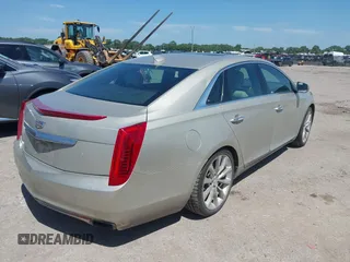 2016 Cadillac XTS Luxury Collection with VIN 2G61M5S32G9101153, listed as a IAAI auction lot 42523917 with 131,054 mi miles and . Bid and sale history available at DreamBid. Image 4.