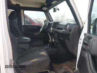2017 Jeep Wrangler Unlimited Sport with VIN 1C4BJWDG2HL721379, listed as a IAAI auction lot 41314767 with 174,228 mi miles. Bid and sale history available at carsss.com. Image 5.