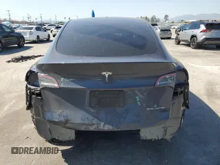 2024 Tesla Model Y Long Range z VIN 7SAYGDEE5RA244641, wystawiony jako Copart lot #51864845 z przebiegiem 23 096 mil mil oraz Szkoda całkowita • Salvage title. Historia ofert i sprzedaży dostępna na DreamBid. Obrazek 6.